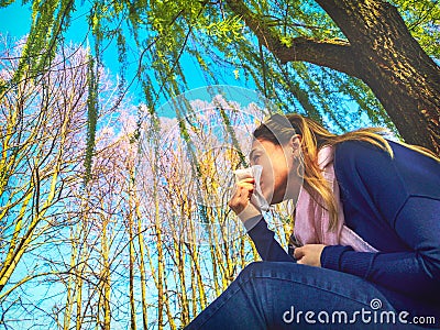 Blowing nose respiratory allergic seasonal flu springtime - Hay fever pollen allergy Stock Photo