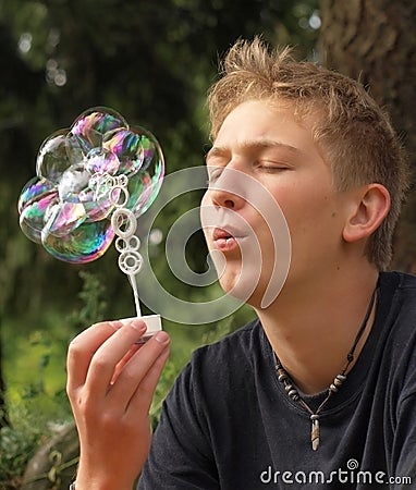 Blowing rainbow bubbles flower Stock Photo