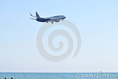 Blue air - Boening 737-Airplane over the sea Editorial Stock Photo