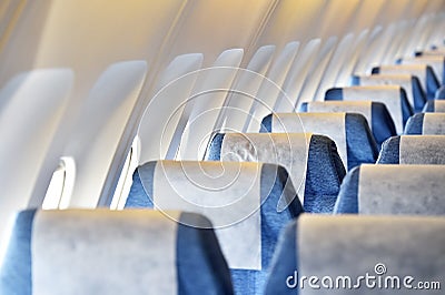 Blue airplane empty seats Stock Photo