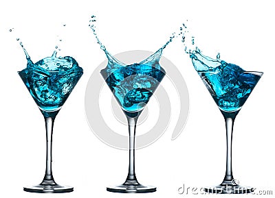 Blue alcohol cocktail set with splash on white Stock Photo