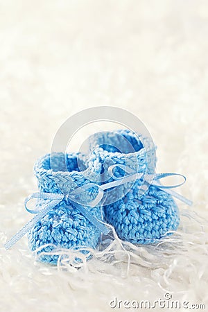 Blue baby crochet shoes Stock Photo