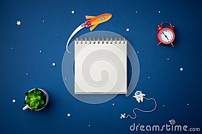 Blue background with astronaut, stars and rocket Stock Photo