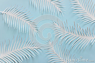 Blue background with spiky white paper feathers Stock Photo