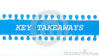 On a blue background with text KEY TAKEAWAYS two white torn strips of paper Stock Photo