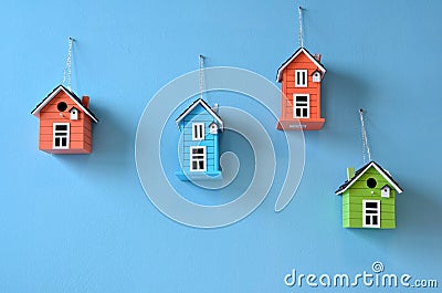 Birds houses on the wall Stock Photo