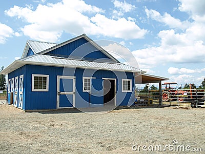 Blue barn in a farm Stock Photo