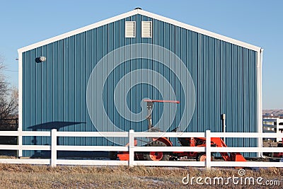 Blue Barn Red Tractor Stock Photo