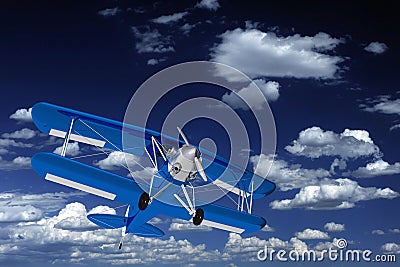 Blue Biplane on the Sky Stock Photo