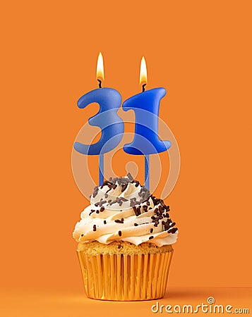 Blue birthday candle and cupcake - Number 31 Stock Photo