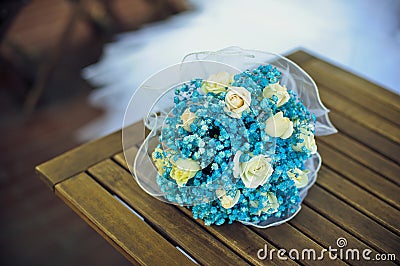 Blue bouquet on a wooden table Stock Photo