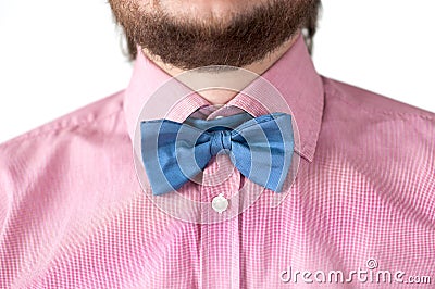 Blue bow-tie with pink shirt. Stock Photo