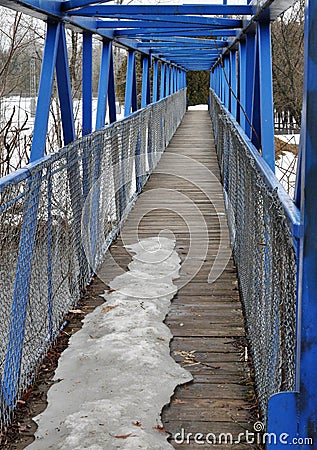 Blue bridge for pedestrians in winter pont bleu pour piÃ©tons en hiver Stock Photo