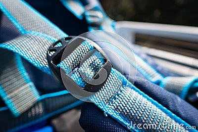 Blue Buckle fastex , length adjusters on bag or backpack strap, fasteners for para cord bracelet. Uttarakhand India Stock Photo