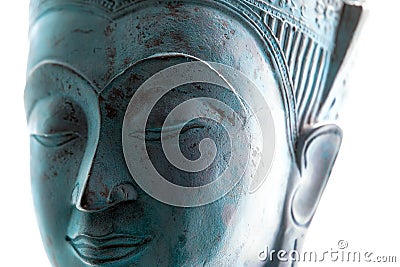 Blue Buddha face. Contemporary spiritual lifestyle close-up. Soft selective focus Stock Photo