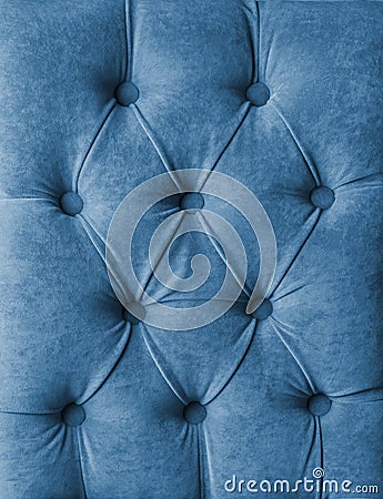 Blue capitone velours textile decoration with buttons Stock Photo