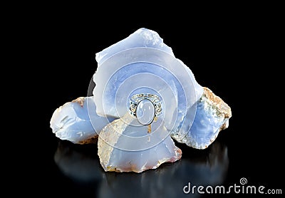 Blue Chalcedony Ring And Rough Stock Photo