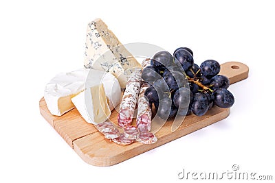 Blue cheese, camembert and dry sausage with grape Stock Photo