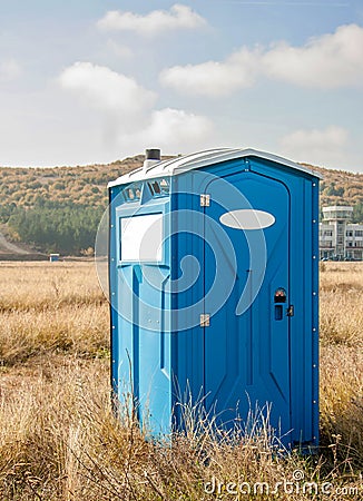 Blue chemical toilet Stock Photo