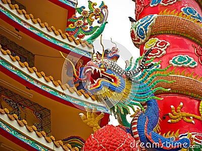 Blue china dragon statue at low tower Stock Photo