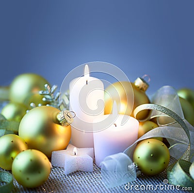 Blue Christmas background with candles , baubles and ribbons Stock Photo