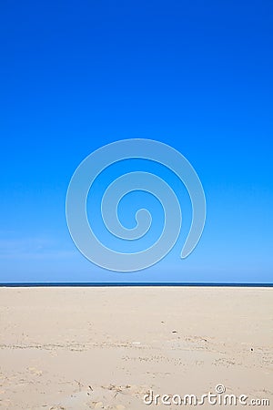 A blue clear sky with beach and ocean Stock Photo