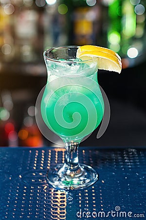 Blue coctail decorate by lemon.Classic alcohol cocktails Stock Photo