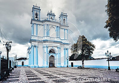 The blue colonial Santa Lucia church. San Cristobal de las Casas, Chiapas, Mexico. Stock Photo