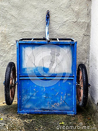 blue color mobile wheelbarrow Stock Photo