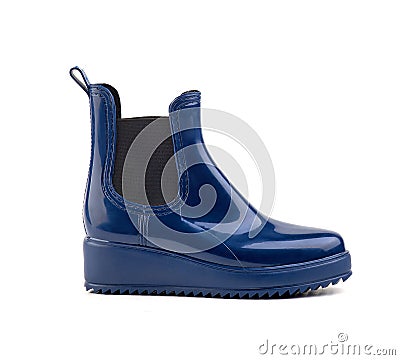 Blue colored rubber women rain boots on a white background isolate Stock Photo