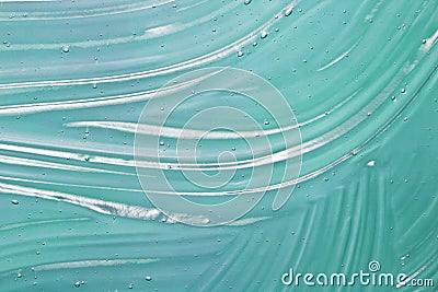 Blue cosmetic gel texture background. Transparent colored skin care, hair styling, hygiene product sample Stock Photo