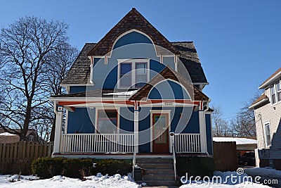 Blue Cottage in Snow Editorial Stock Photo