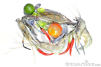 Blue crab, giant freshwater lobster, lime, tomato and hot chillies Stock Photo