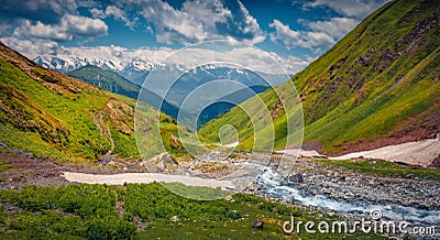 Blue creek flowing in Caucasus mountains. Stock Photo