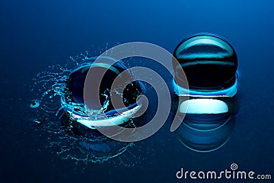Blue crystal balls - splash in the water Stock Photo