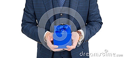 Blue cube cardboard box pack tied with elegant ribbon being held in male hands for holiday celebration isolated on white Stock Photo