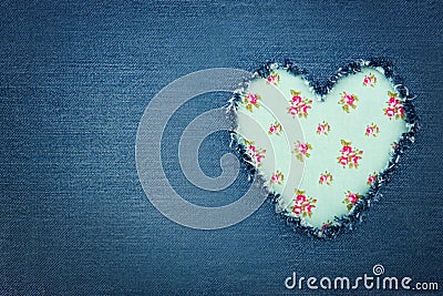 Blue denim jeans with green heart Stock Photo