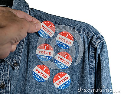 Blue denim working clothing with many Voted stickers on white background Stock Photo