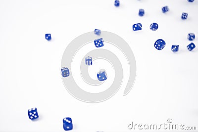 Blue Dice falling on a white background Stock Photo