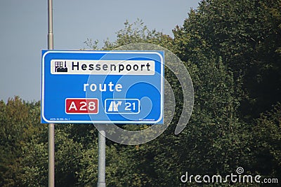 Blue direction sign heading Hessenpoort route A28 in Ziwolle Editorial Stock Photo