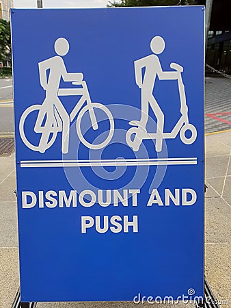 Dismount and push signage Stock Photo