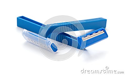 Blue disposable shavers on white background Stock Photo