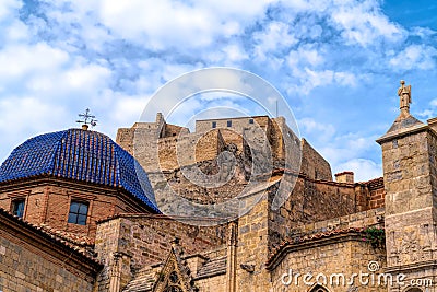 Blue dome church and castle Morella Spain historic medieval walled town Stock Photo