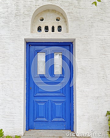 Blue door of a Mediterranean island house Stock Photo