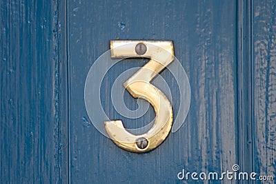 Blue door number 3 Stock Photo