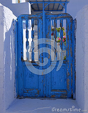 Blue door peeling paint Stock Photo