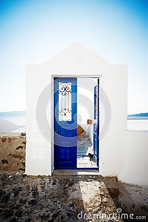 Blue door on Santorini Stock Photo