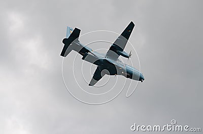 Blue Double Helix Rescue Airplane Flying Right Stock Photo