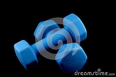 Blue Dumbells on a Black Background Stock Photo