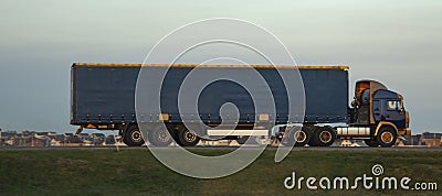 Blue empty mock up truck in high speed template for car branding and advertising. View from side Stock Photo